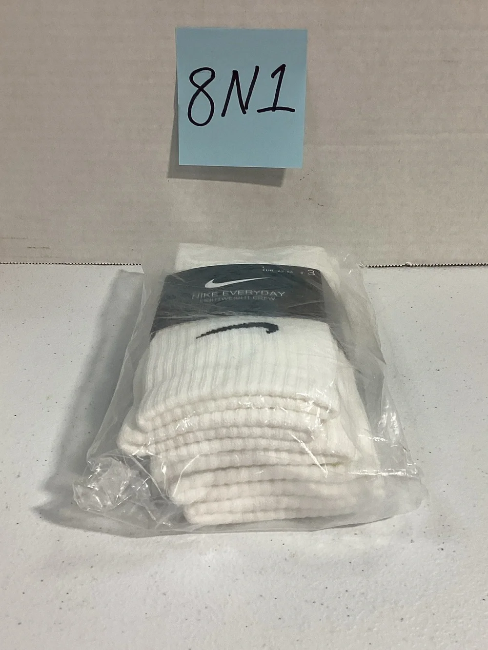 Nike White Crew Athletic Socks with Black Swoosh (3-Pack)